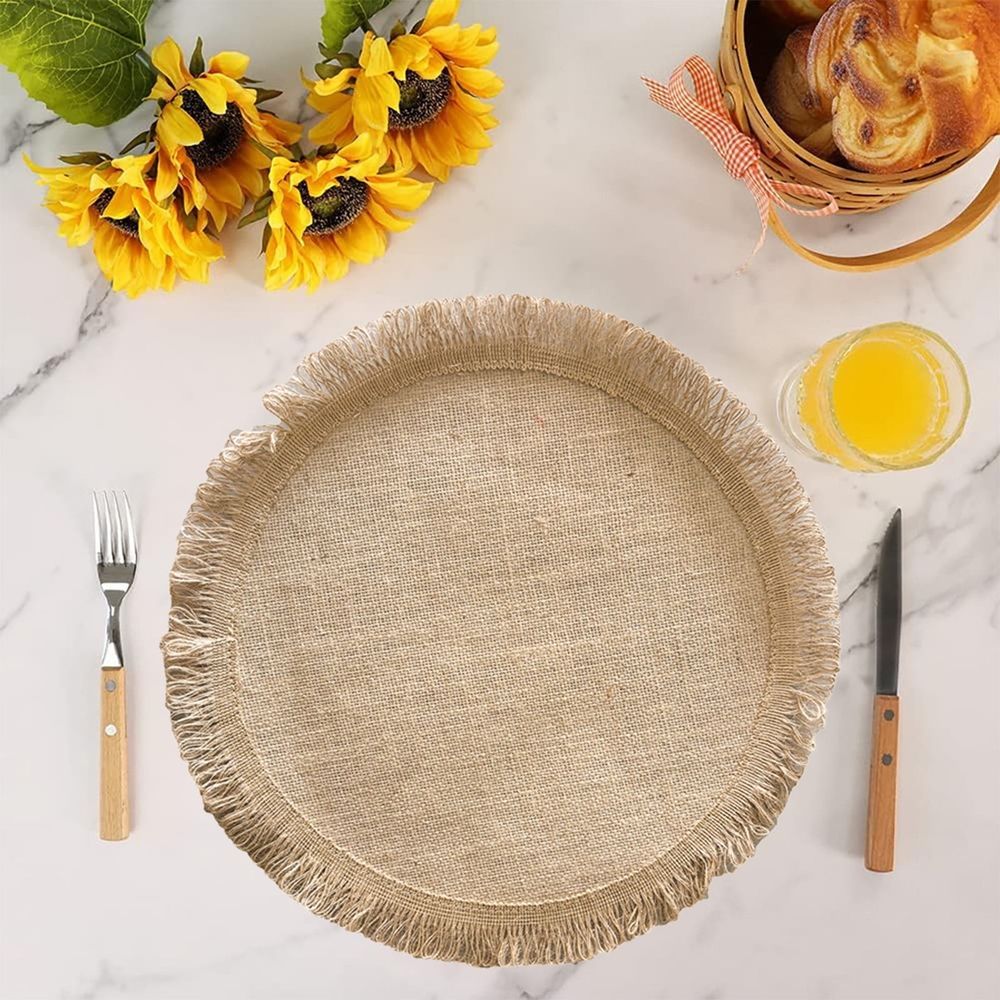 Round jute placemat with tassel fringe, natural linen material, heat-resistant table mat for bowls and dishes, easy to clean.