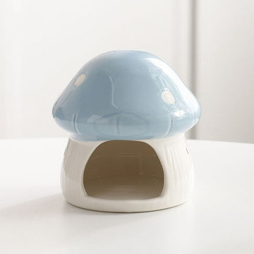 Mushroom-shaped ceramic hamster hideaway house with cozy cave design for small pets, decorative cage accessory by Everything Baby