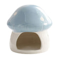 Mushroom-shaped ceramic hamster hideaway house with cozy interior, decorative small animal cage accessory by Everything Baby