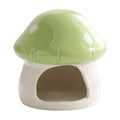 Ceramic mushroom-shaped hamster hideaway house with cozy interior, decorative small animal cage accessory by Everything Baby.