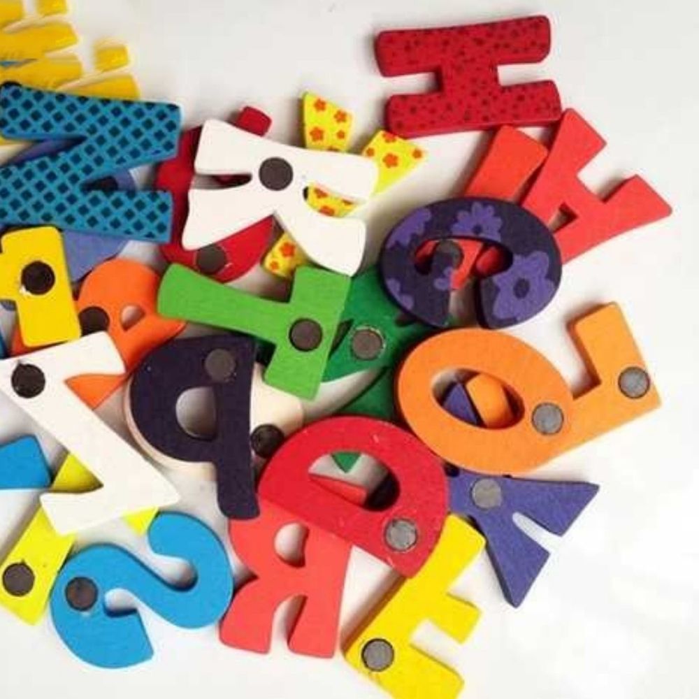 26-piece wooden magnetic alphabet set for kids, includes soft magnets for refrigerator decor and educational learning toys.
