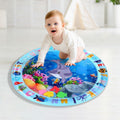 Inflatable water play mat with floating fish toys for kids and toddlers, featuring a sensory activity pad for indoor and outdoor fun.