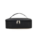 Small reusable water-resistant lunch bag with handle, thermal interior, suitable for kids, from Everything Baby.