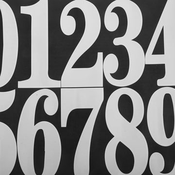 White mailbox address numbers set by Everything Baby, easy to install for a clean, modern look in home or mailbox decor.