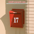 White mailbox address numbers set from Everything Baby, easy to install for a clean, modern look on mailboxes.