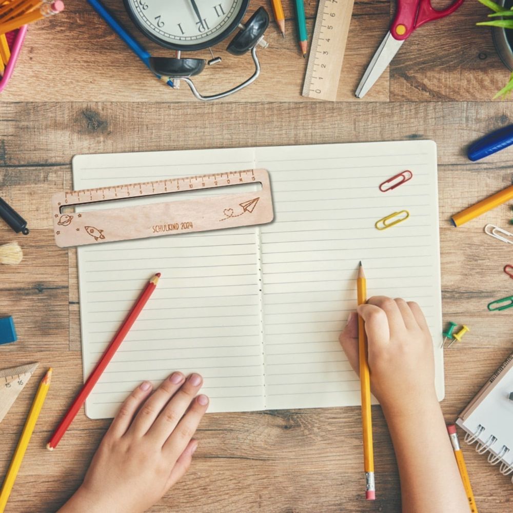 Personalized 2-in-1 wooden ruler and reading aid for kids, designed for classroom and drafting use, from Everything Baby.
