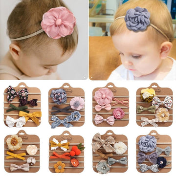 Set of 5 soft nylon baby headbands and bows by Everything Baby, handmade girls hair accessories for newborns, infants, and toddlers.