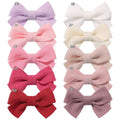 20-pack of baby girl hair clips with 2-inch bow alligator clips for toddlers and fine hair, from Everything Baby.