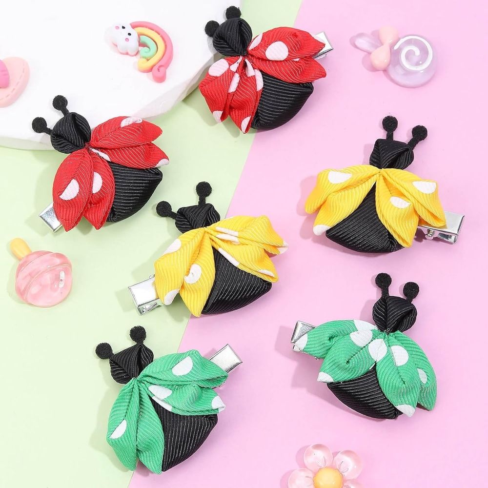Set of 8 baby hair bows with cute bee and ladybug designs, toddler girl hair accessories from Everything Baby, colorful ribbon clips