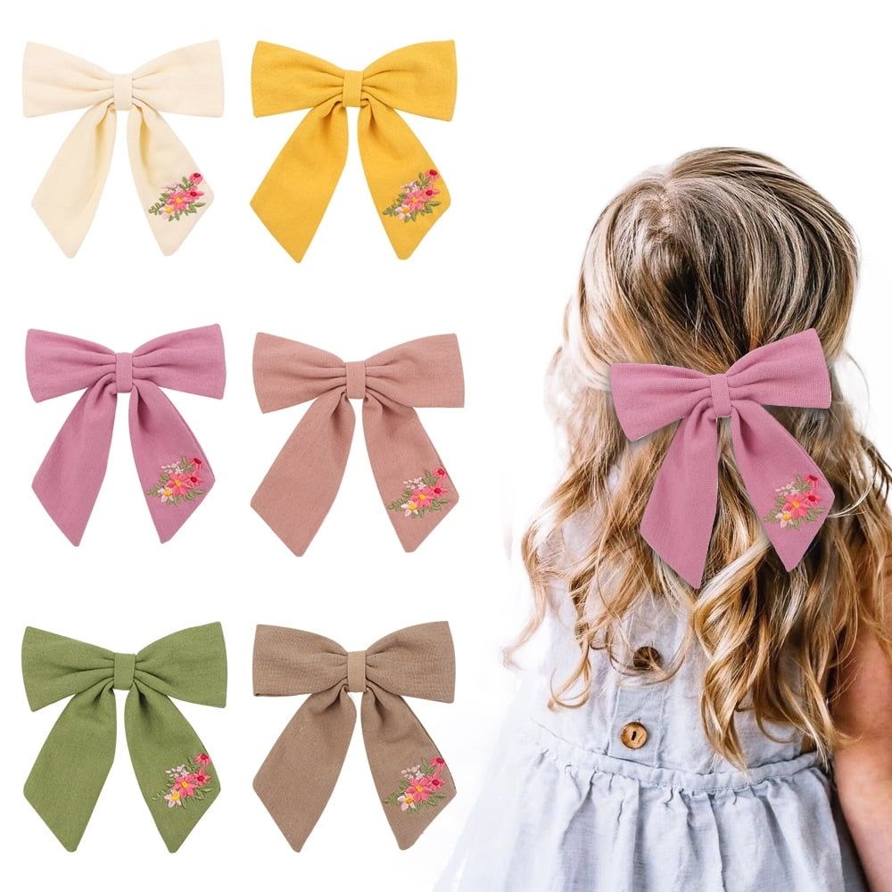 Handmade neutral cotton linen long tail hair bows for toddler girls, cute hair clips from Everything Baby for little girls and kids