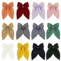 Baby girl hair accessories featuring big bow alligator hair clips and duckbill barrettes by Everything Baby, perfect for girls and teens.