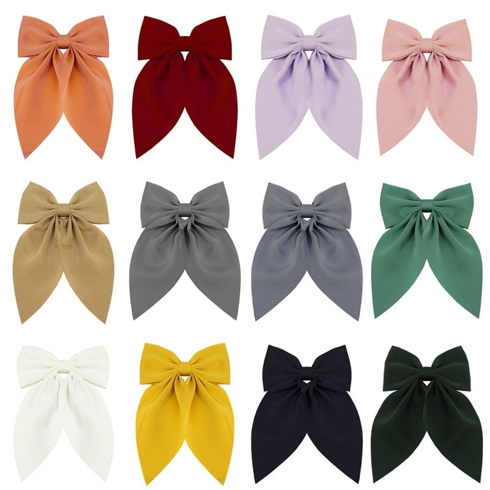 Baby girl hair accessories featuring big bow alligator hair clips and duckbill barrettes by Everything Baby, perfect for girls and teens.