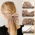 Big pink bow alligator hair clip and duckbill barrette for girls and women, stylish hair accessories from Everything Baby.