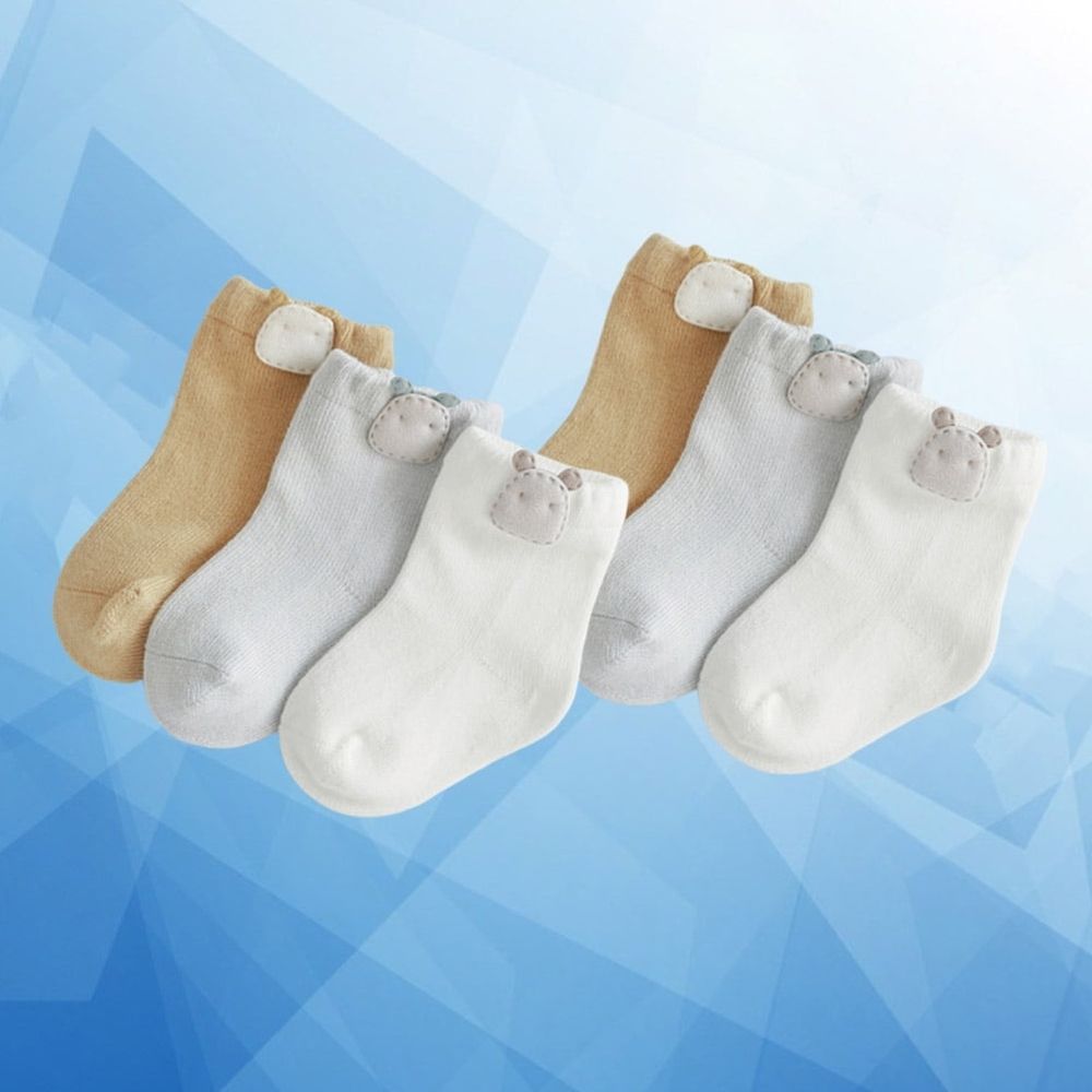Set of three soft, breathable baby socks in assorted colors for newborns and infants up to 6 months old by Everything Baby