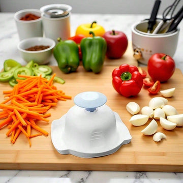 Blue food safety holder for mandolin slicer and graters, protects fingers during vegetable slicing and peeling.