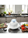 Blue food safety holder for mandolin slicer, protects fingers during vegetable slicing, ideal for kitchen food prep safety.