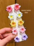 Set of 10 colorful flower hair clips for girls, cute style, suitable for daily wear and vacation outfits.