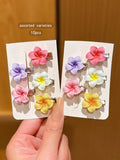 Set of 10 colorful flower hair clips from Everything Baby, cute claw clips perfect for daily wear and kid’s hair accessories.