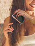 Portable GENAI Mini cordless hair straightening comb with negative ions, lightweight design, long battery life, suitable for travel.