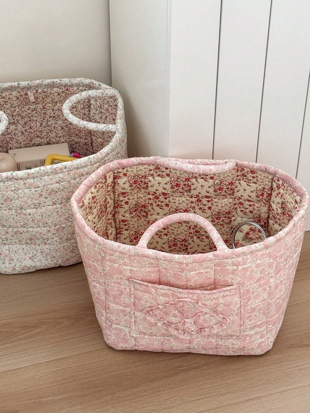 White floral print quilted storage basket with handle, large capacity foldable toy and laundry storage for kids and baby items.