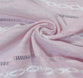 Pink boho-style rectangular tablecloth with tassel stripe pattern, polyester woven desk cover for dresser or bedside table.