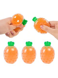 Five carrot-shaped stress relief squeeze balls for adults, made of elastic fruit-like material, perfect for play and Easter basket fillers.