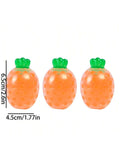 Five carrot-shaped squeeze stress relief balls from Everything Baby, elastic fruit toys ideal for kids' play and Easter baskets.