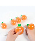 Three carrot-shaped stress relief balls by Everything Baby, elastic fruit squeeze toys for kids and adults, ideal for play and stress relief.