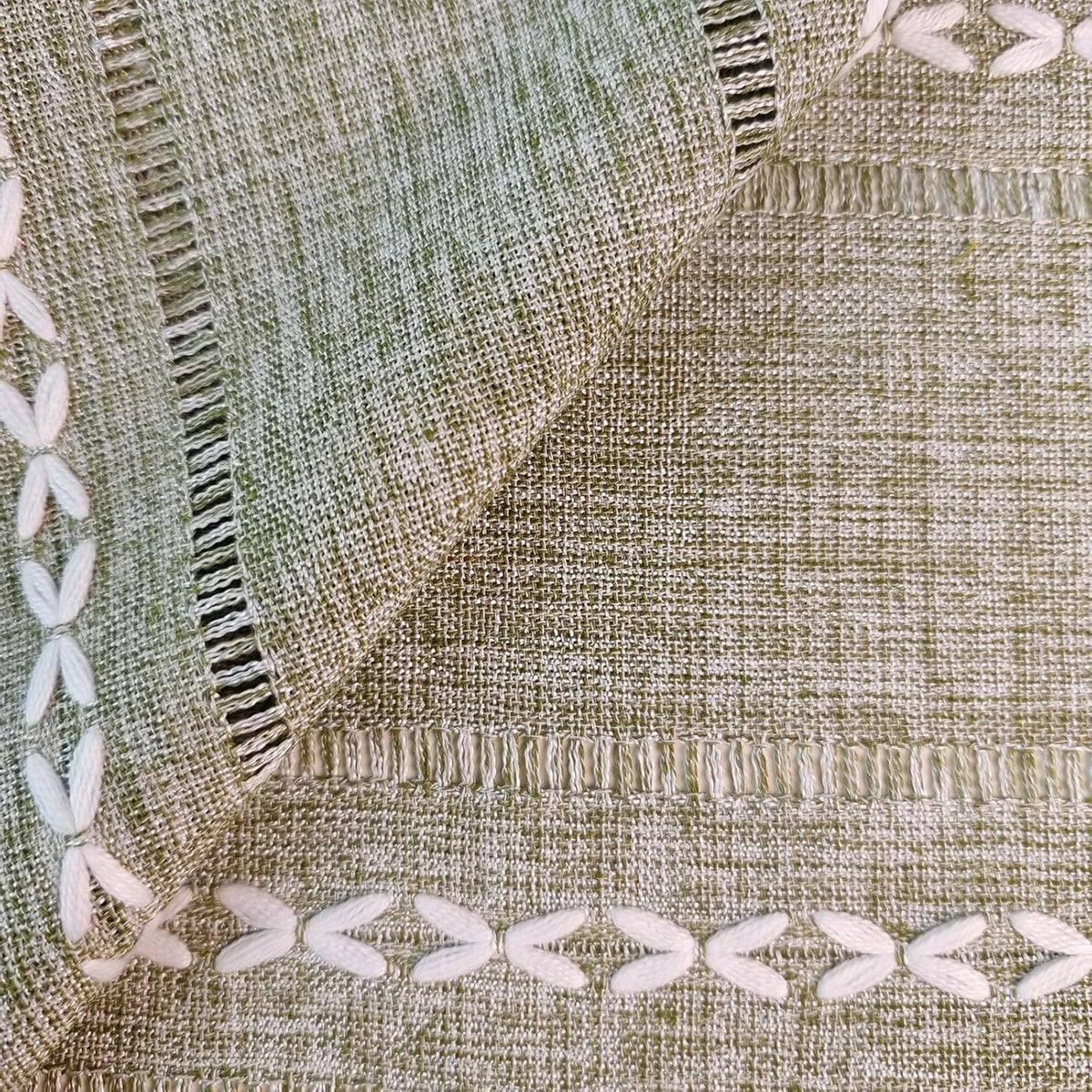 Green boho-style rectangular tablecloth with tassel stripe pattern, polyester woven desk cover for dresser or bedside table.