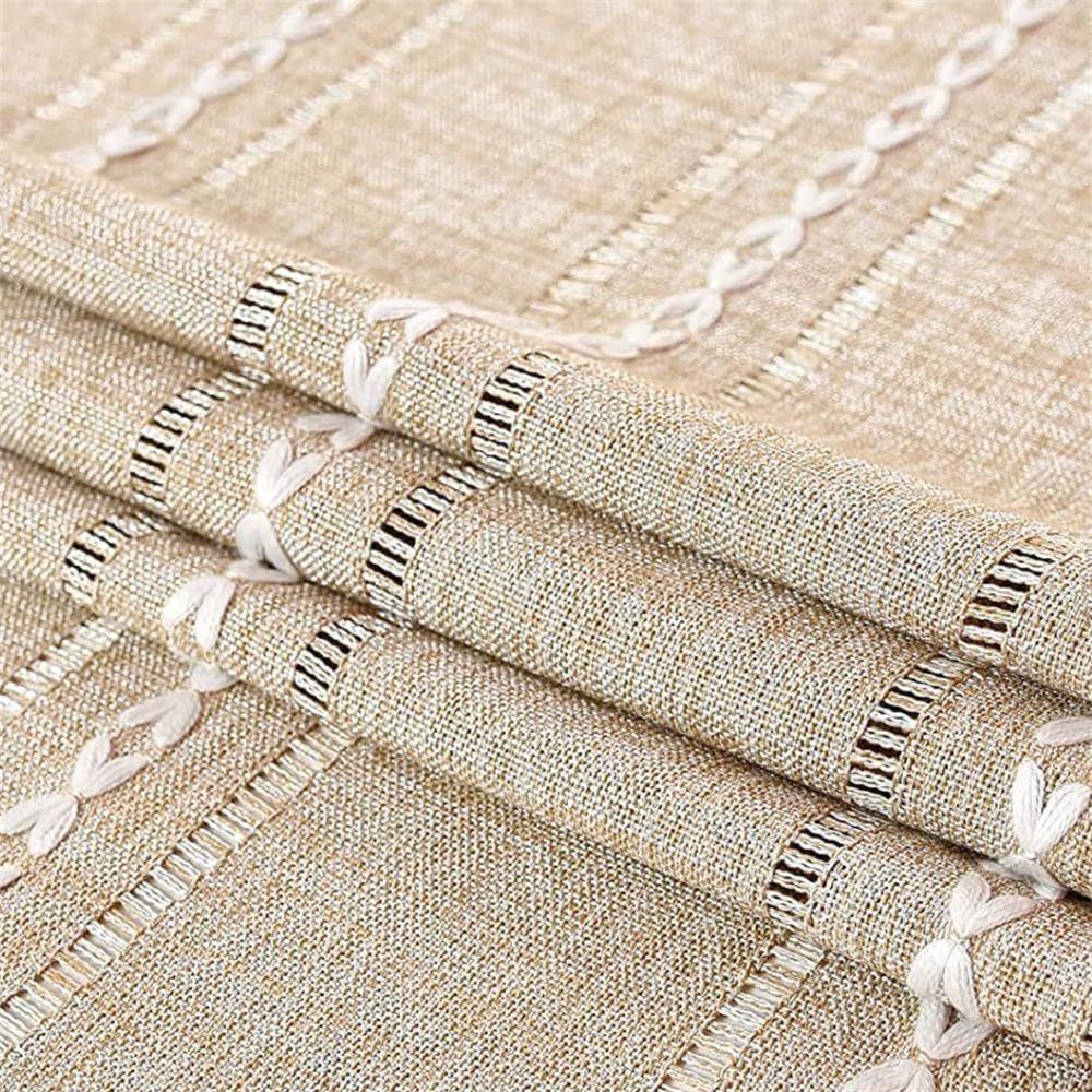 Boho brown rectangular tablecloth with tassel stripe pattern on a dresser or bedside table, polyester woven home decor accessory.