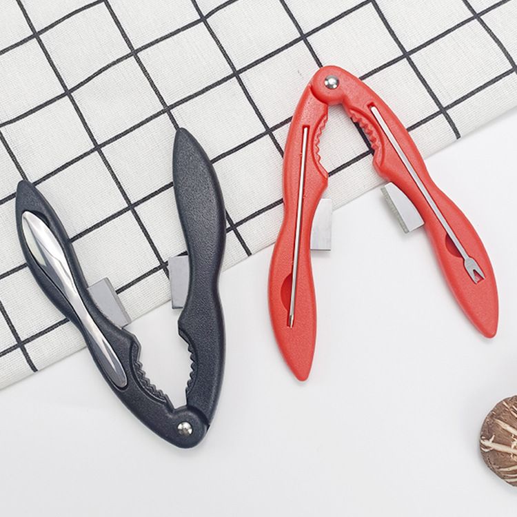 Black and red crab disassembly tool set with built-in storage box, designed for easy crab and seafood cracking and eating.