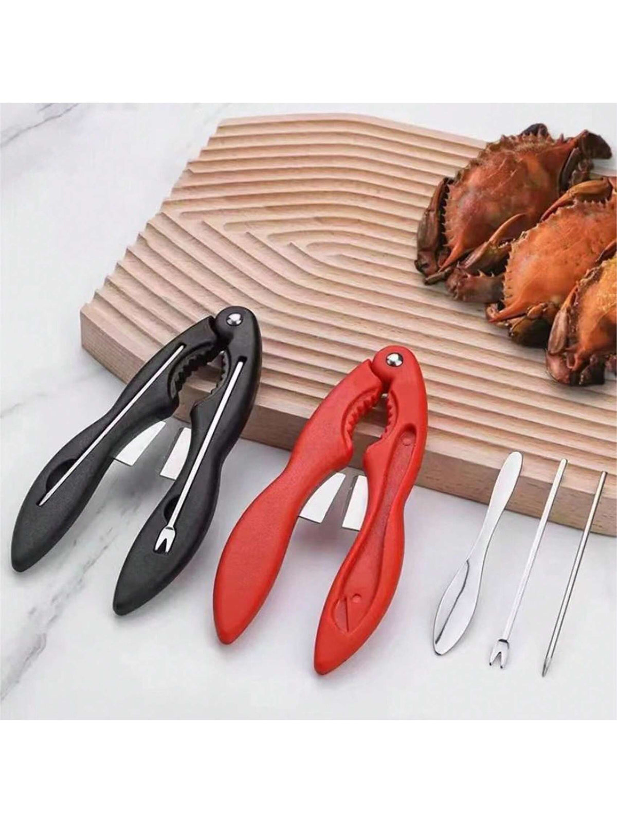 Two-piece crab disassembly tool set in black and red with built-in storage box, designed for easy seafood shelling.