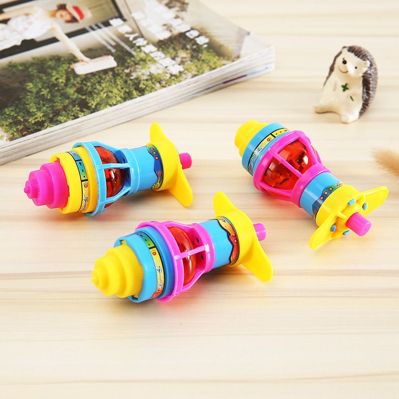 10-pack LED flashing UFO spinning tops with gyroscope, colorful lights, and spinning motion, perfect as kids' party favors and activity toys.