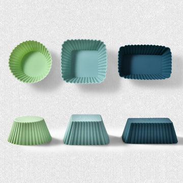 Silicone cupcake liners with three round shapes, reusable baking cups for muffins, pastries, and cake molds, suitable for baking.