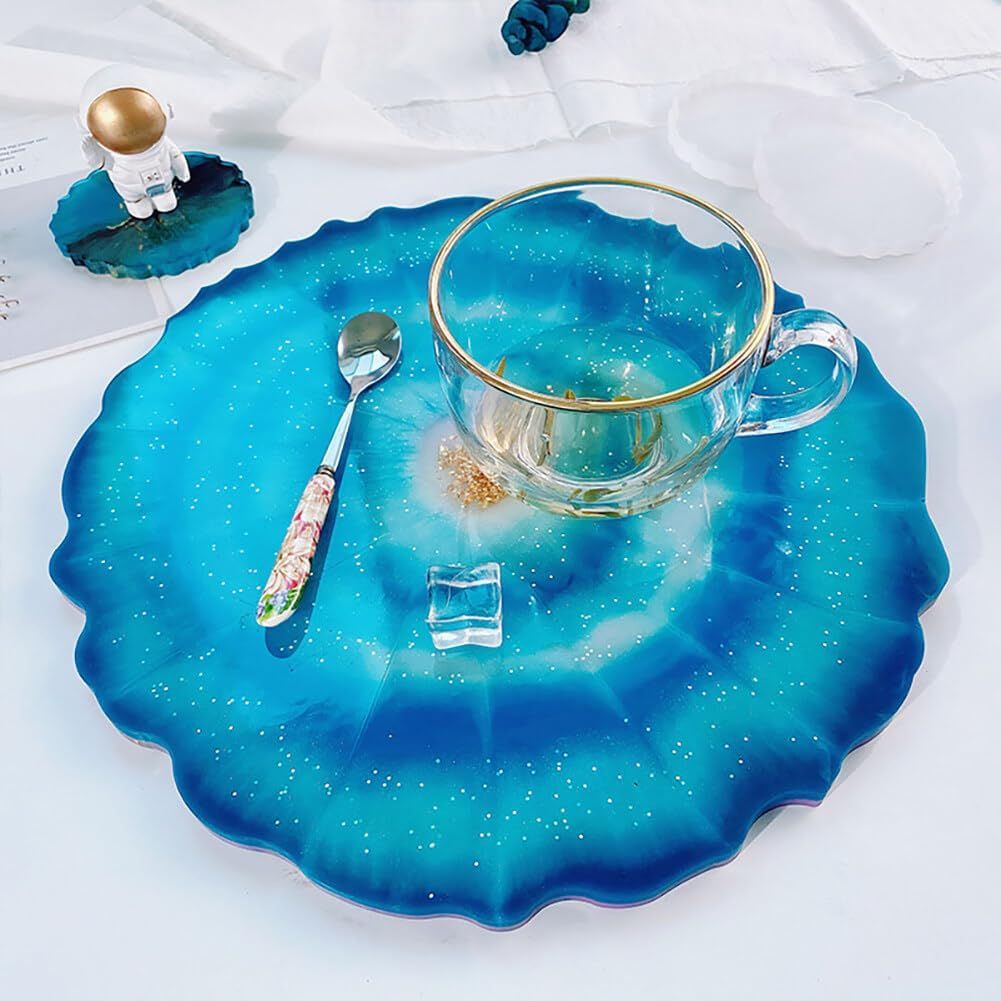 Silicone mold featuring fruit-shaped food tray and coaster designs, ideal for DIY epoxy casting and baby feeding accessories.