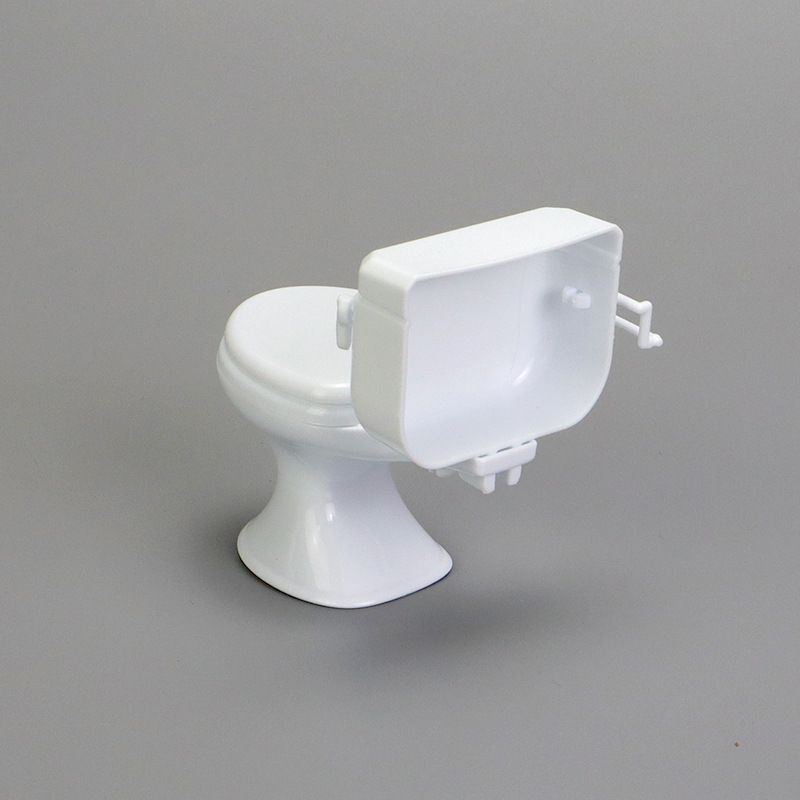 Miniature baby toilet seat toy by Everything Baby, perfect for pretend play with dollhouse bathroom furniture.