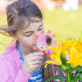 Pair of pink and blue 5X handheld magnifying glasses for kids and seniors, ideal for hobbies, science, and outdoor play.