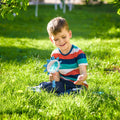 Pink and blue handheld magnifying glasses for kids and seniors, ideal for reading, hobbies, and science exploration.