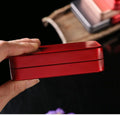 Four small metal tin boxes with lids, portable storage containers ideal for organizing small items or toys.