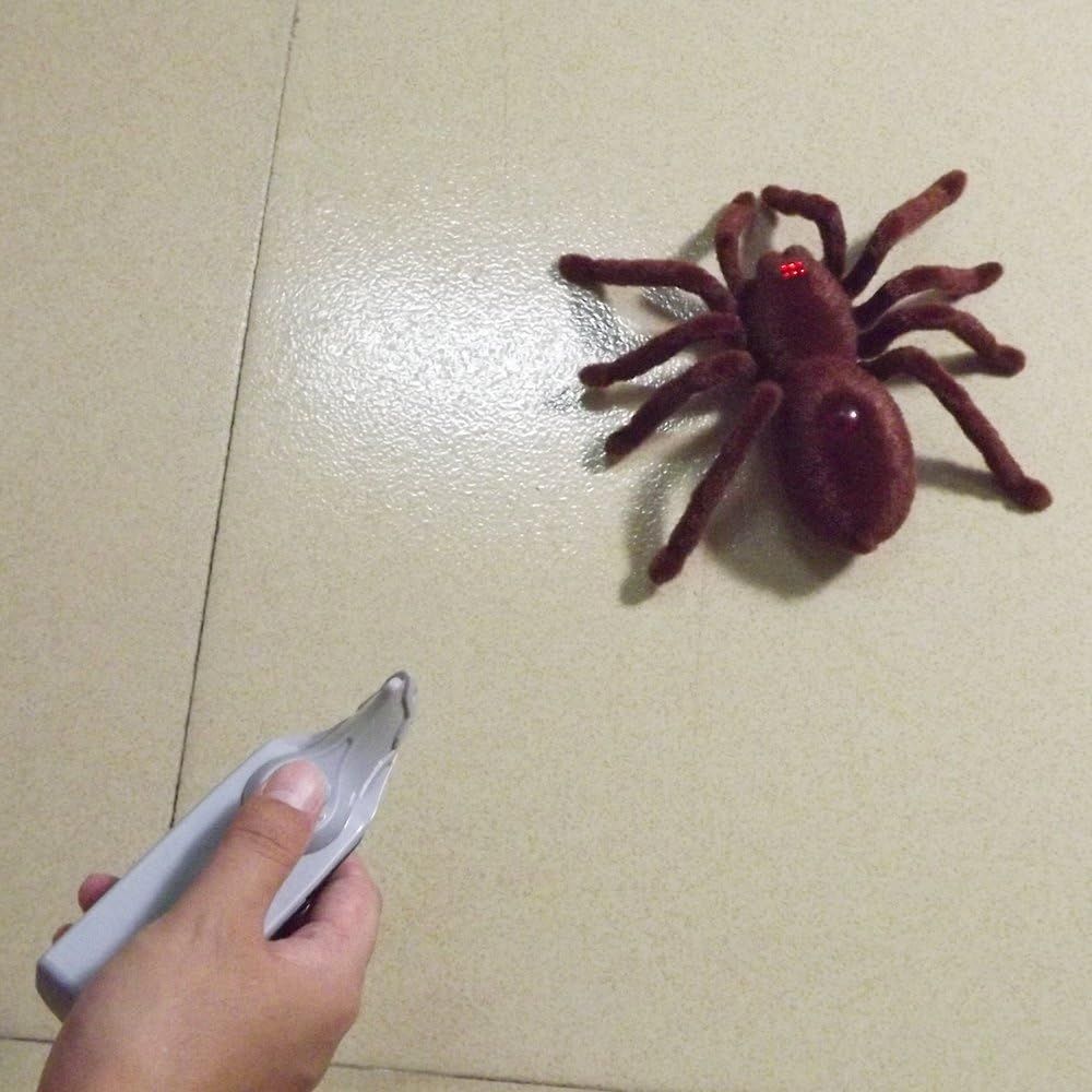 Everything Baby remote control spider toy for kids, designed for pranks and Halloween tricks, resembling a realistic spider for pretend play.