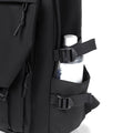 Black waterproof backpack by Everything Baby with high capacity, side pockets, suitable as a trendy daily travel bag for men and women.