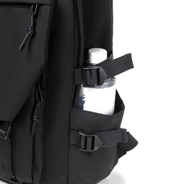 Black waterproof backpack by Everything Baby with high capacity, side pockets, suitable as a trendy daily travel bag for men and women.