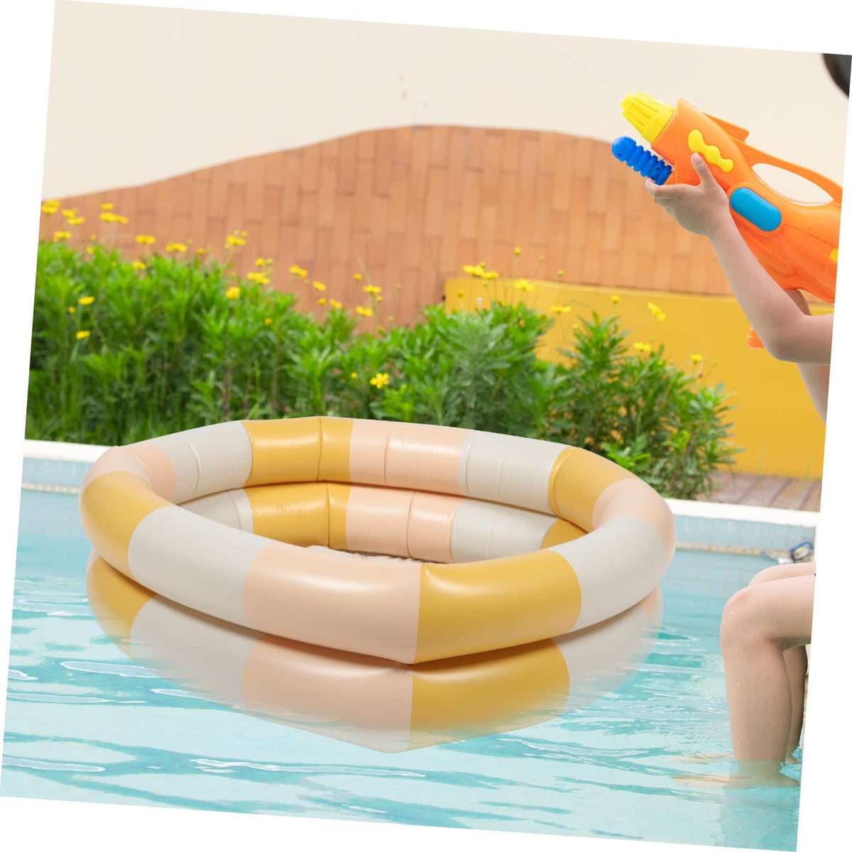 Inflatable dinosaur-shaped small kids' swimming pool from Everything Baby, 90cm, ideal for indoor and outdoor use.