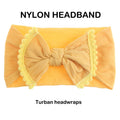 Handmade baby headbands with bows and elastics, soft and colorful hair accessories for newborns, infants, and toddlers by Everything Baby.