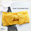 Set of three handmade baby headbands with bows and elastics, suitable for newborns, infants, and toddlers, by Everything Baby.