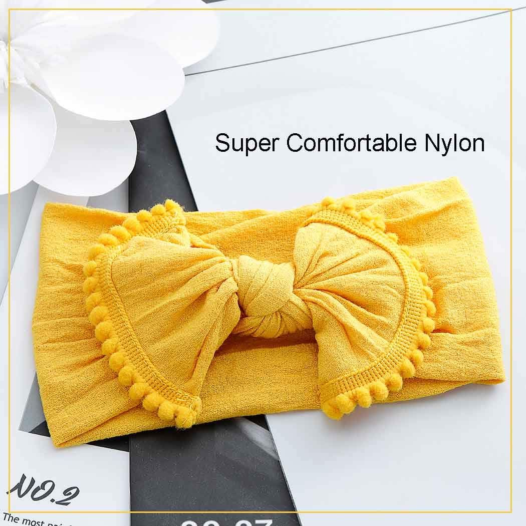 Set of three handmade baby headbands with bows and elastics, suitable for newborns, infants, and toddlers, by Everything Baby.