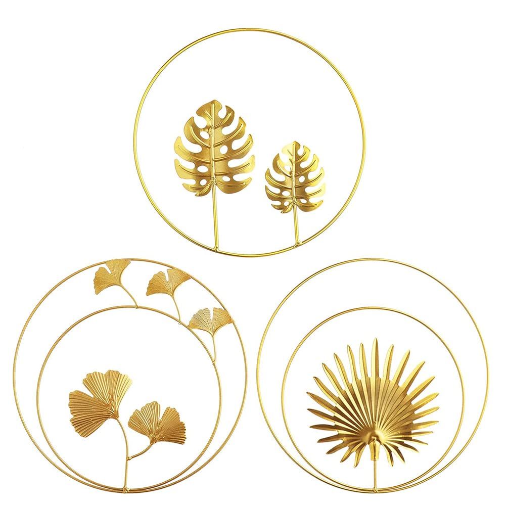 Three gold metal wall decor pieces featuring ginkgo and maple leaf designs, 11 inches, easy to install for bedroom decoration.
