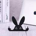 Black rabbit statue with a raised middle finger, adorable 5.9-inch toy figure from Everything Baby, suitable as quirky decor or playful kids' toy