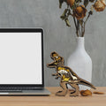 Wooden T-Rex dinosaur decor figurine by Everything Baby, suitable for home or living room table decorations.