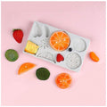 Colorful strawberry, lemon, kiwi, and tangerine-shaped silicone molds for DIY cake, fondant, biscuits, soap, and pudding.